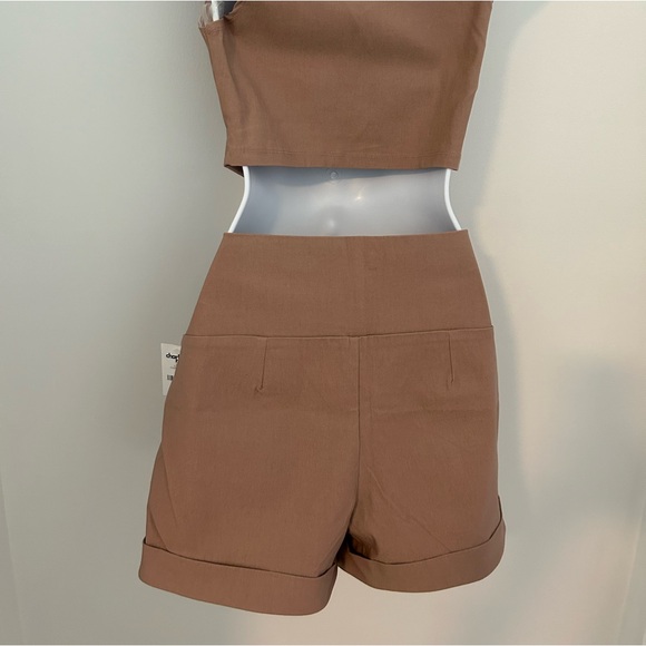 Mauve colored top and shorts.
Stretchy - Picture 5 of 12